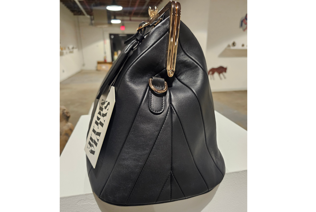 Panelled black leather kiss-lock handbag