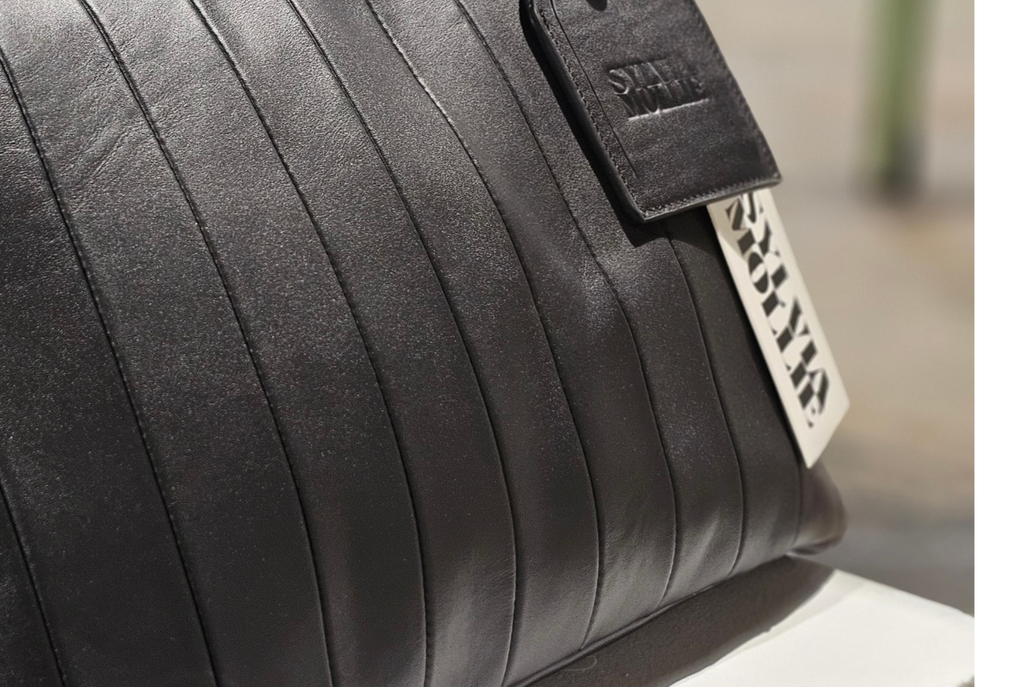 The Fannie Bag in black stripe leather