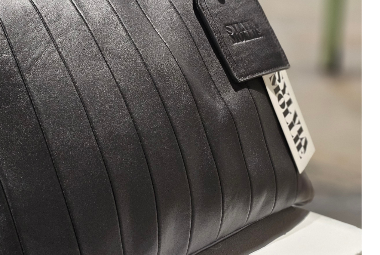 The Fannie Bag in black stripe leather