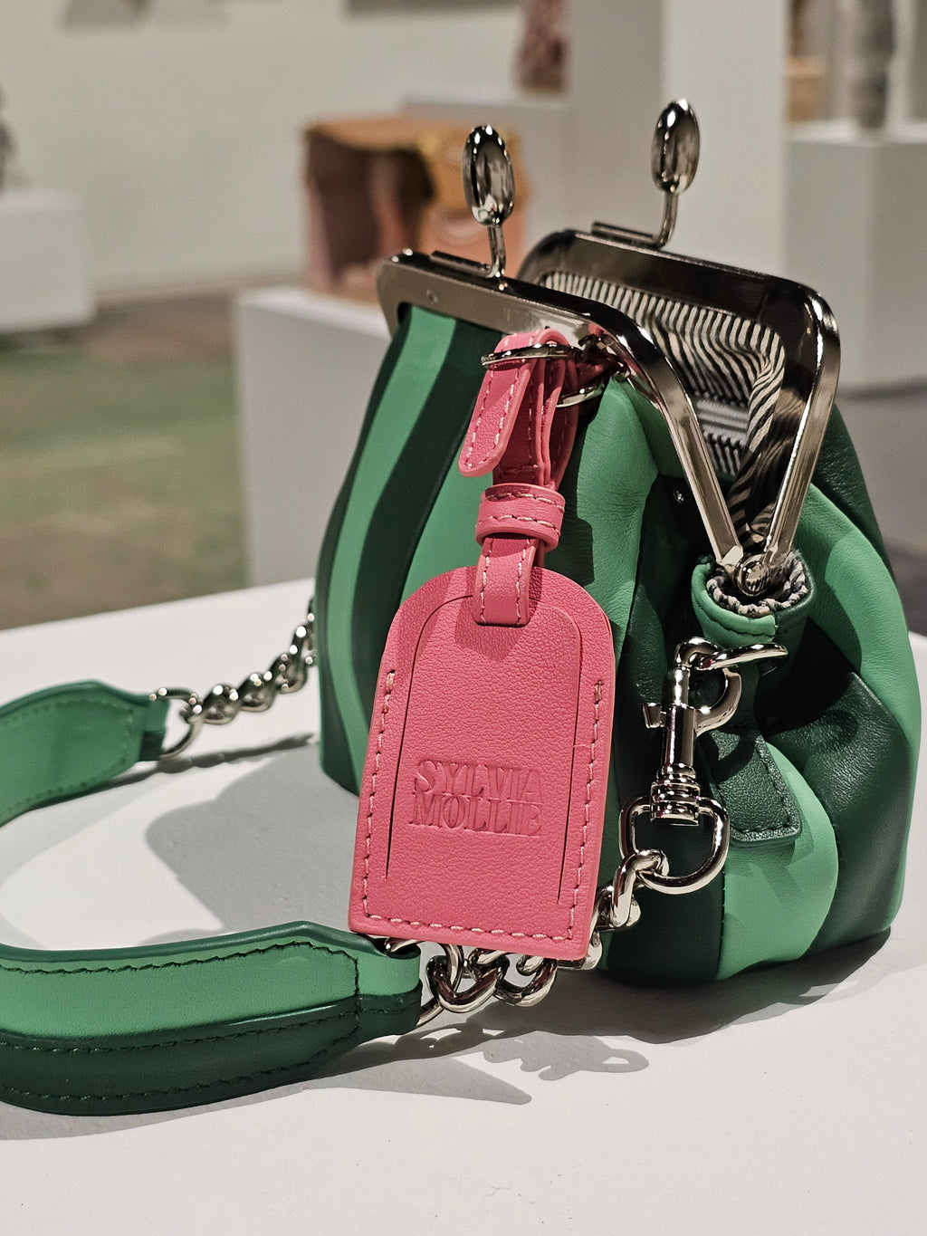 Two-tone green mini leather bag by Sylvia Mollie