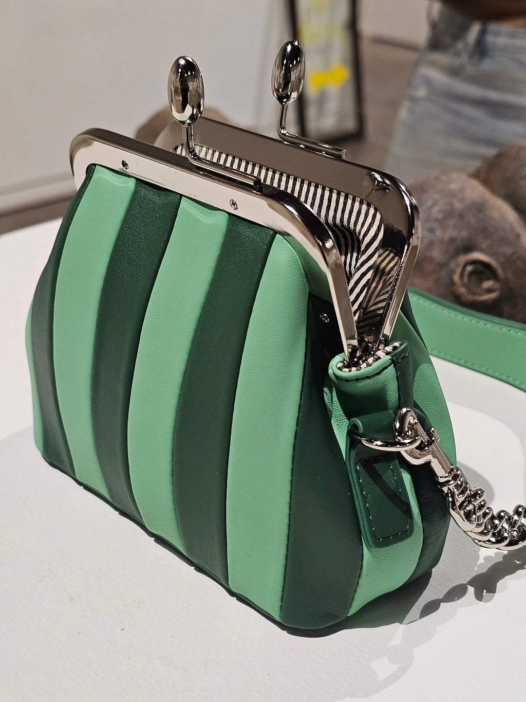 Green two-tone Lil Fannie mini kiss-lock bag