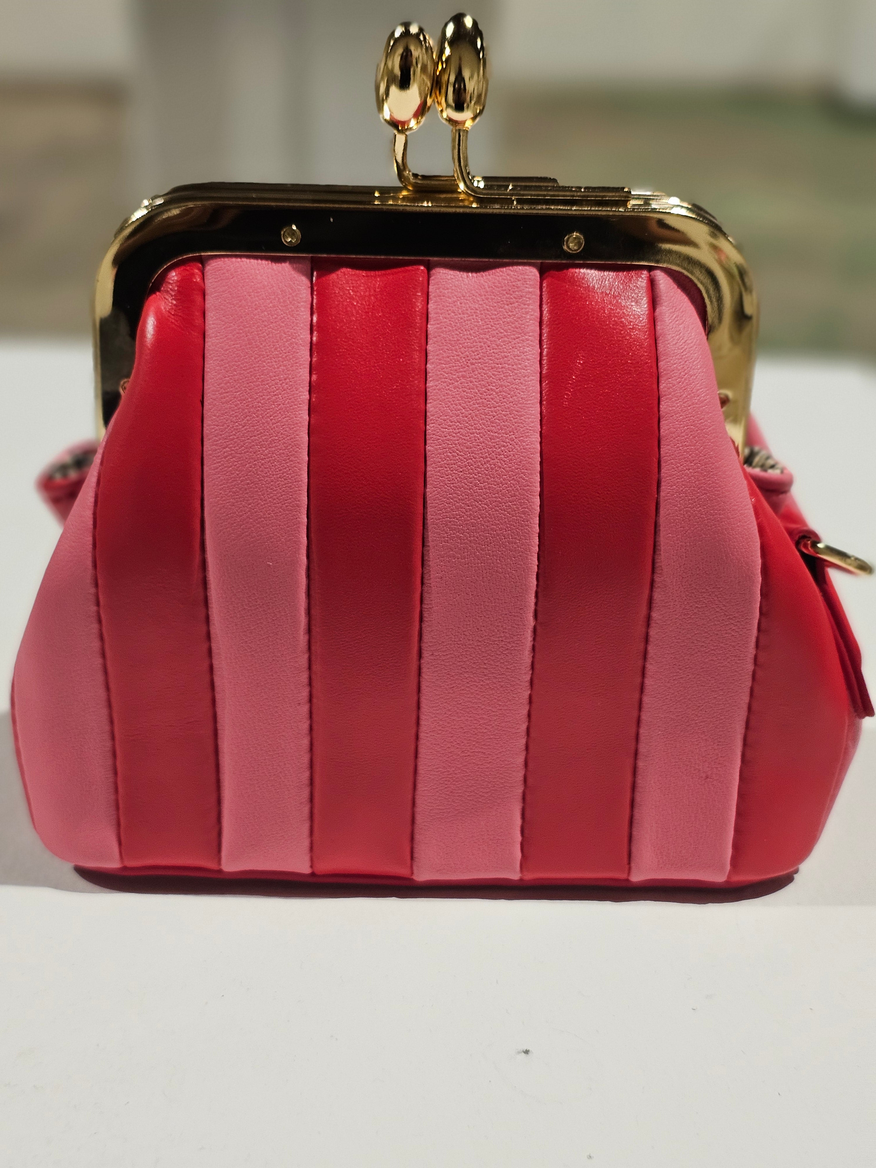 Bright red mini leather bag with gold-tone hardware
