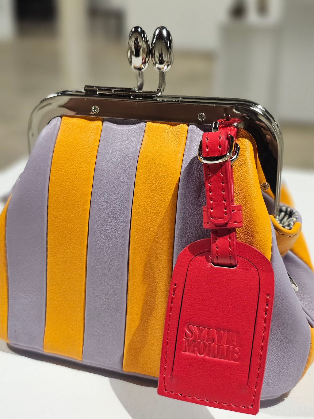 Yellow and lilac Lil Fannie with a chain handle