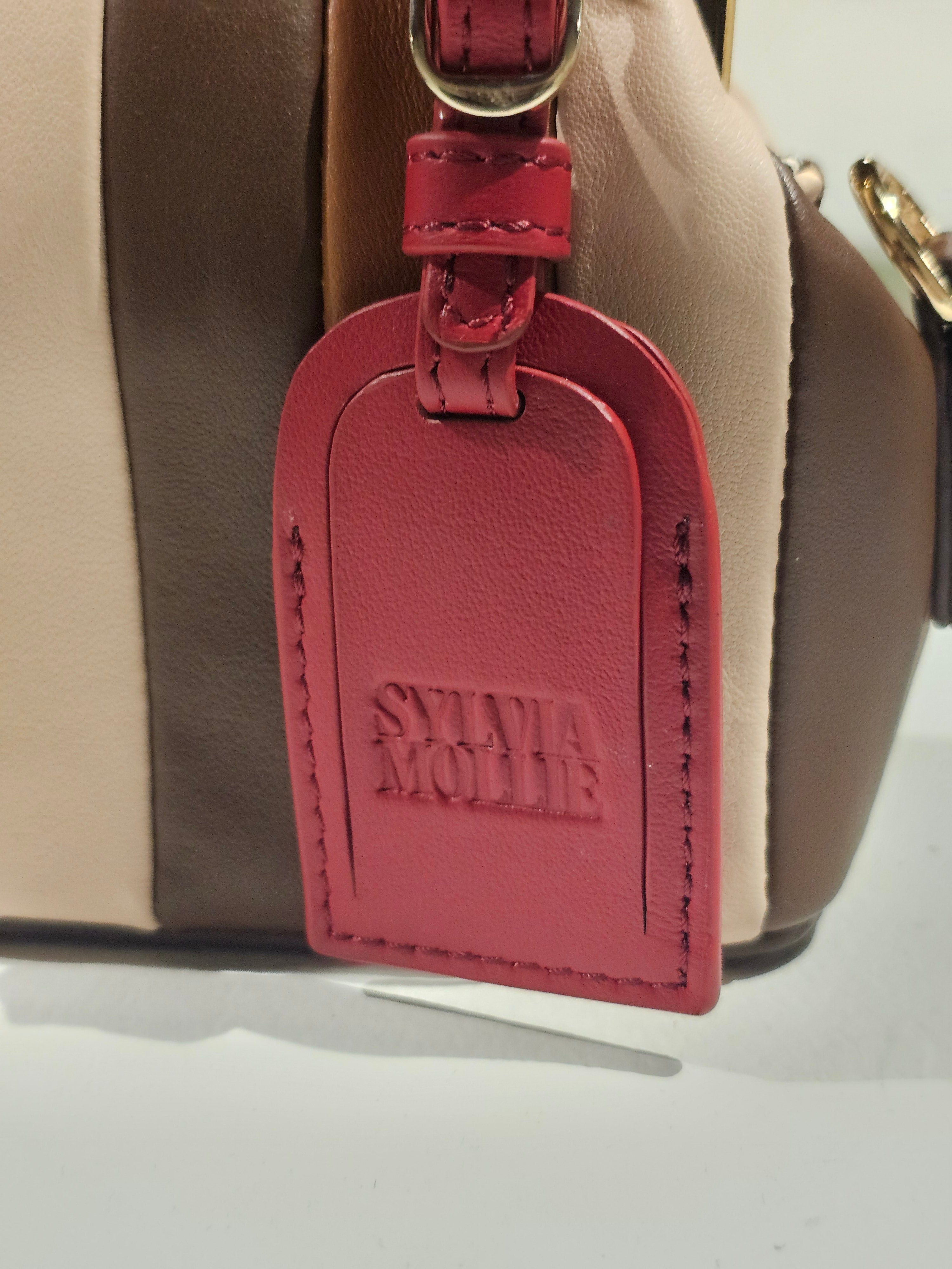 The Sylvia Mollie Lil Fannie in chocolate and dark red