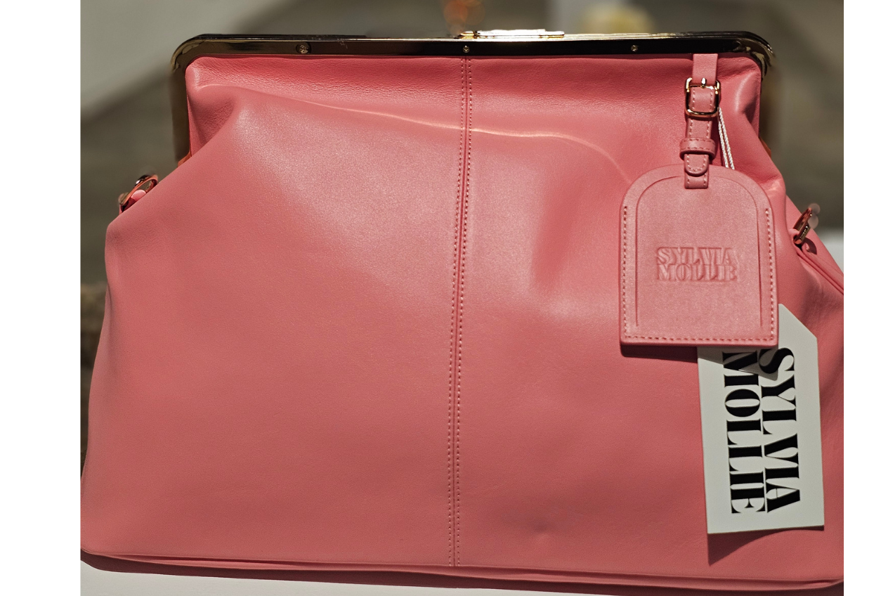 The Fannie Bag in Pank with a gold-tone frame