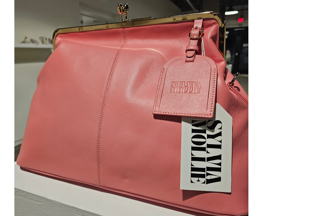 The Fannie Bag in coral pink leather with gold-tone hardware