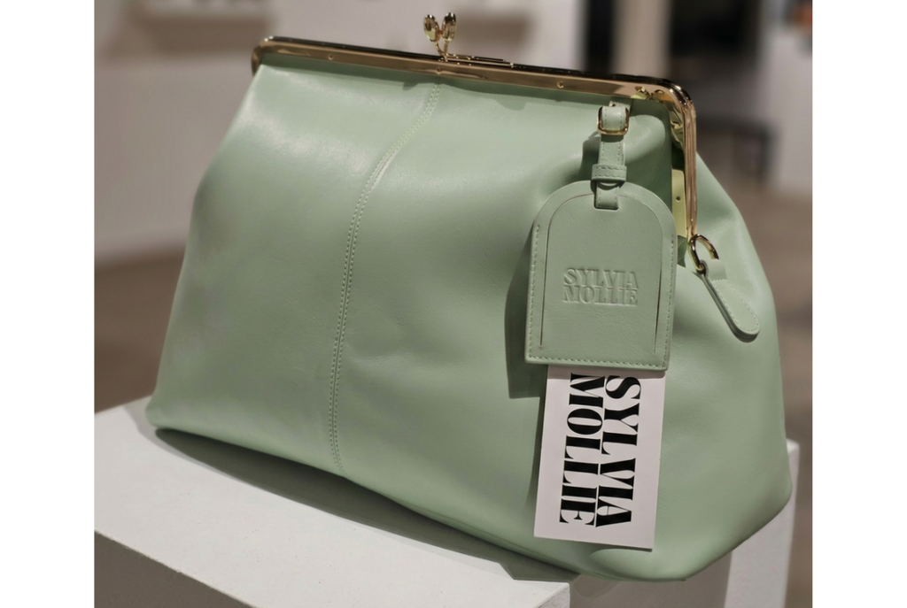 The Fannie Bag in soft mint with a matching leather hangtag