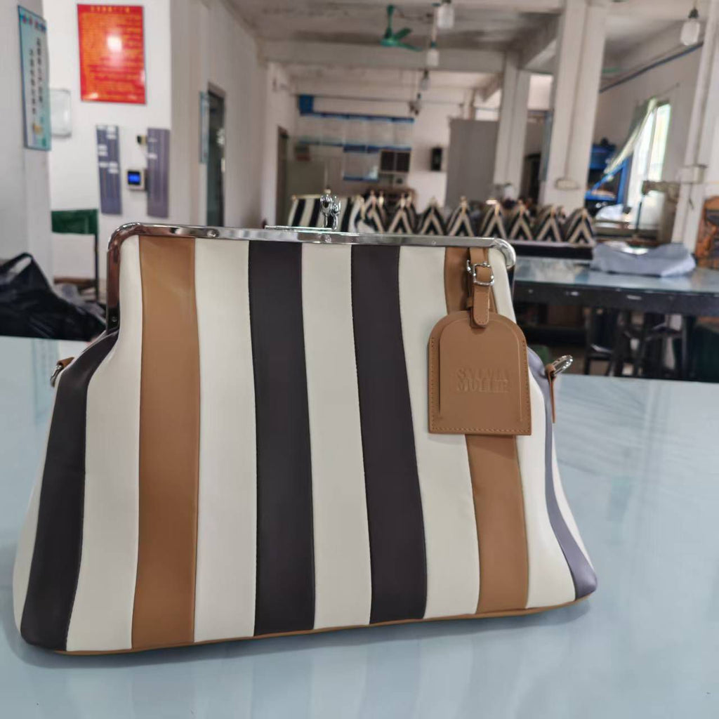 Choco Mix striped leather Fannie Bag by Sylvia Mollie