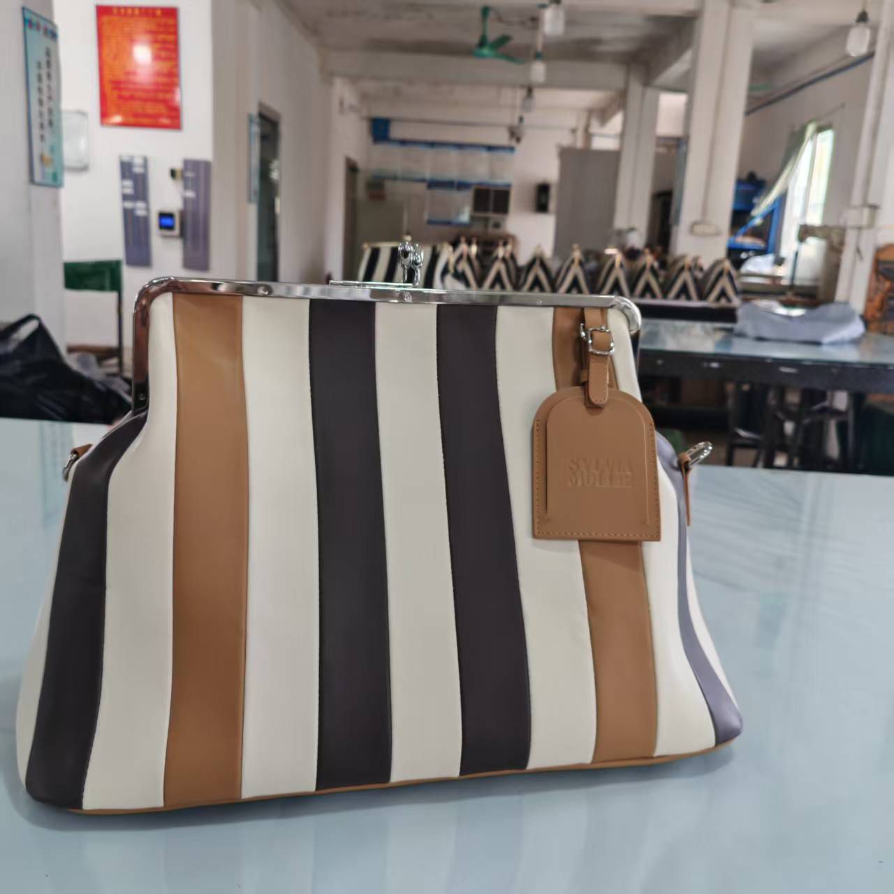 Choco Mix striped leather Fannie Bag by Sylvia Mollie